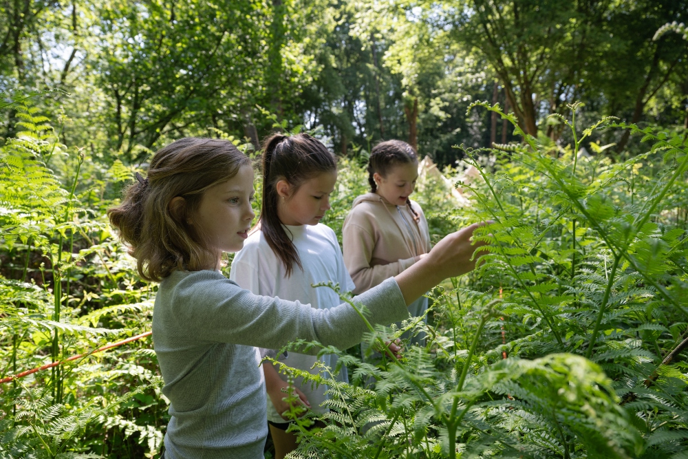 girls exploring nature on residential trip