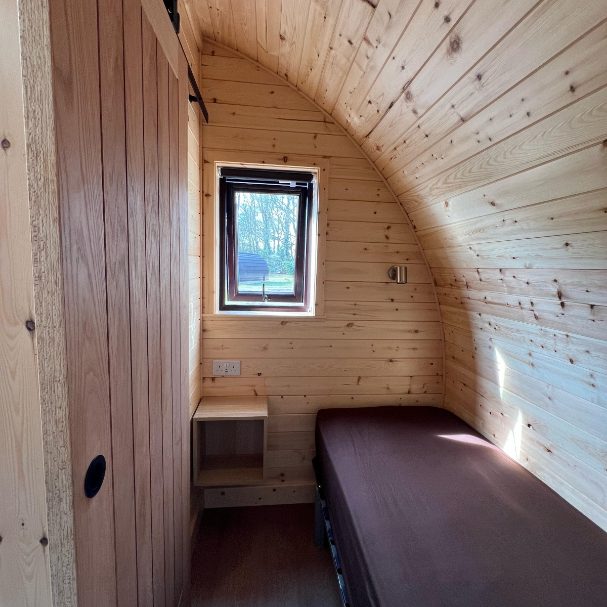 inside the teacher bedroom in a teacher pod