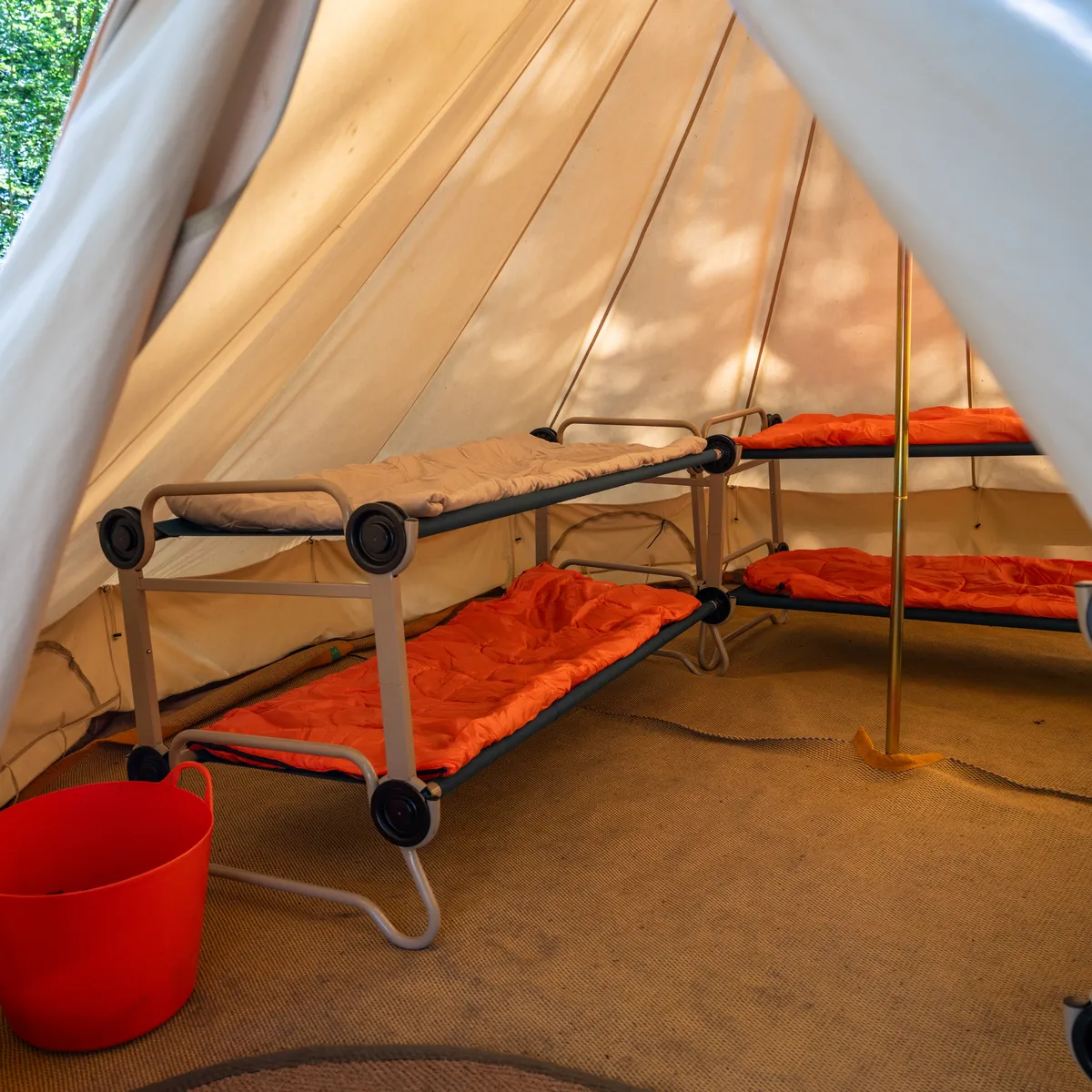bunk beds inside pupil tent