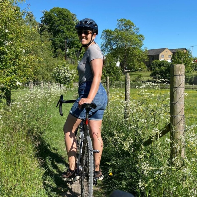 Gemma our Rootd Instructor on bike